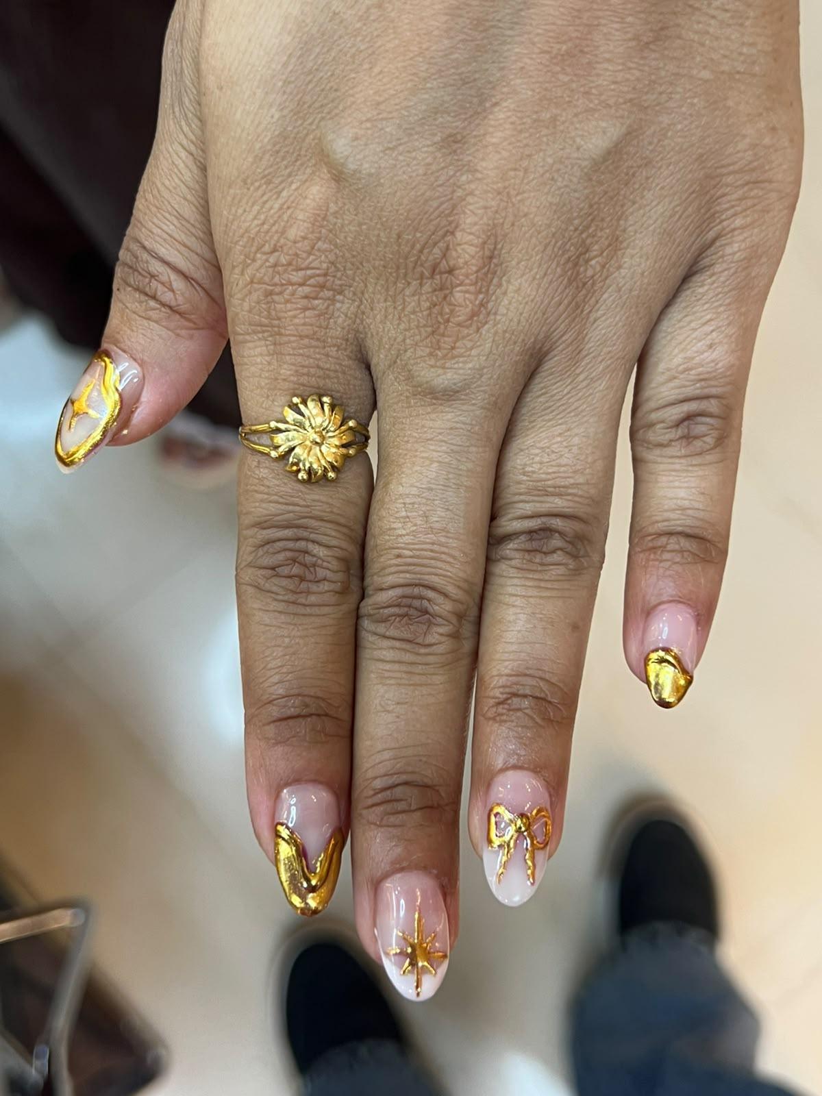 Nail art at Cozy Comb Unisex Salon